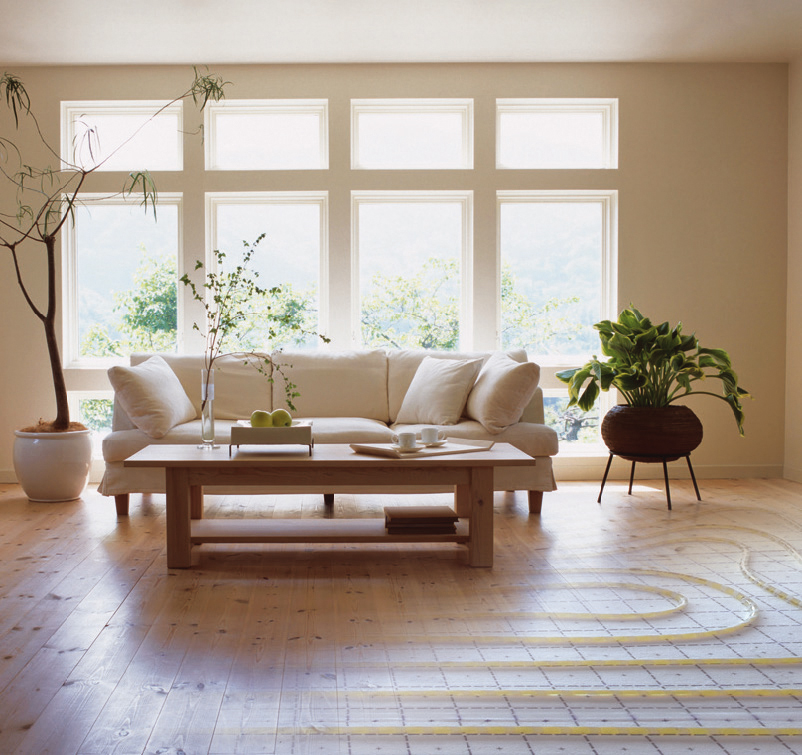 Eine Flächenheizung/-kühlung schafft behagliche  Wärme ohne sichtbar zu sein.